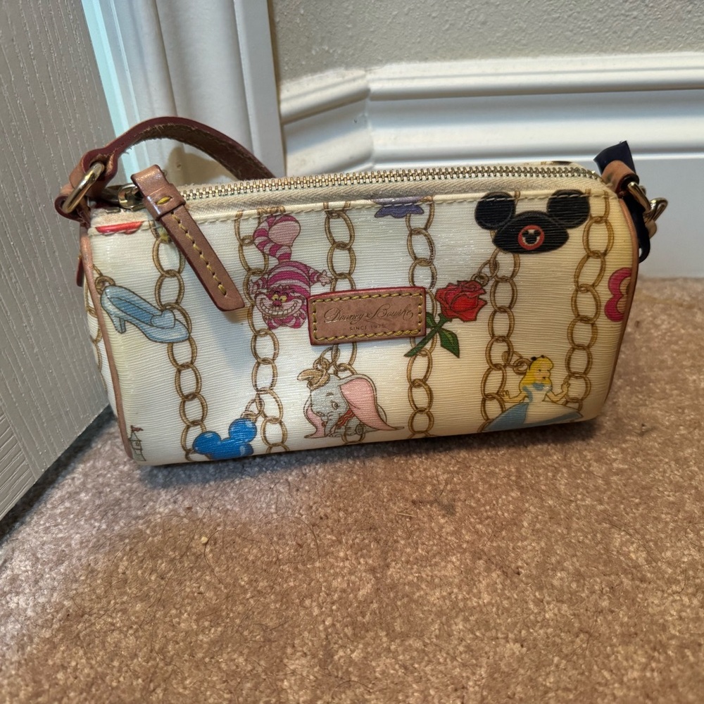 Dooney & Bourke Cream Disney Character Print Wristlet